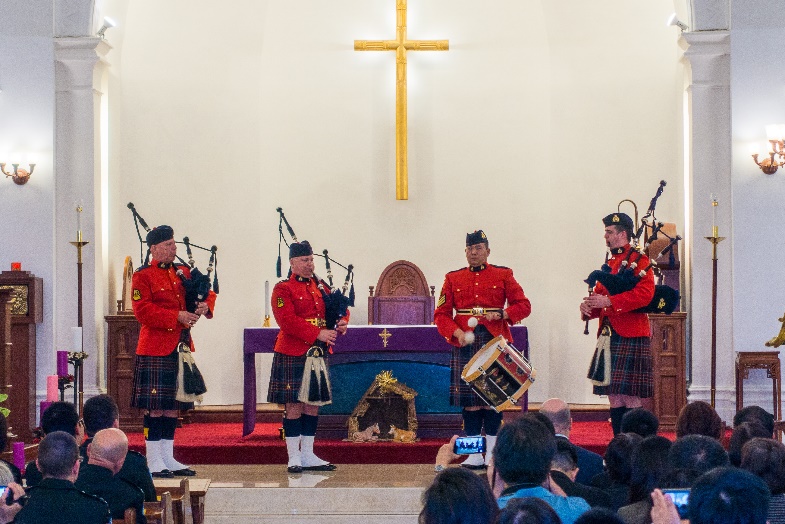 Members of RCMP Pipe Band Perform at St John's Cathedral, Kowloon