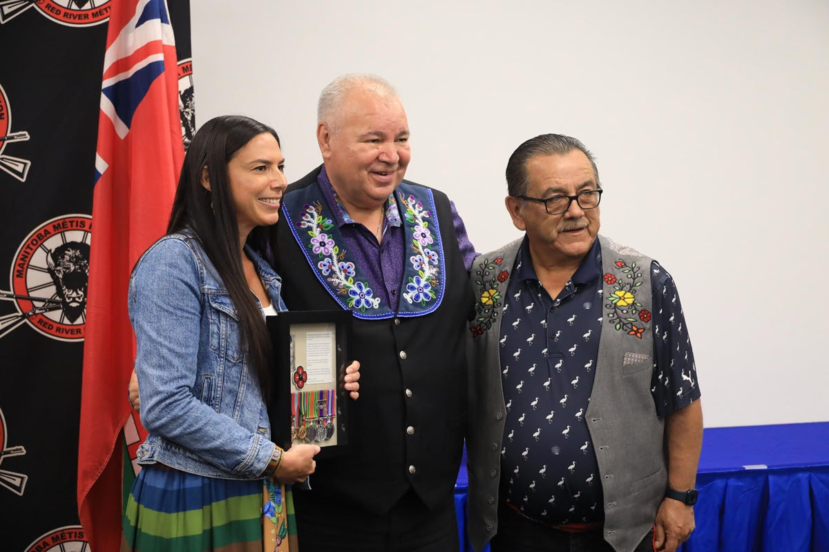 Julie Carver, President David Chartrand and Minister Jack Park