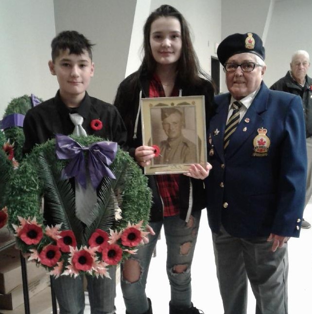 Helen Prieston, (widow of Riley Prieston WG, HKV) arranged to have Tyson & Devin Graham, great-grandchildren of HK Veteran Norman Broome of Swan River, MB lay a wreath for all Hong Kong Veterans. 