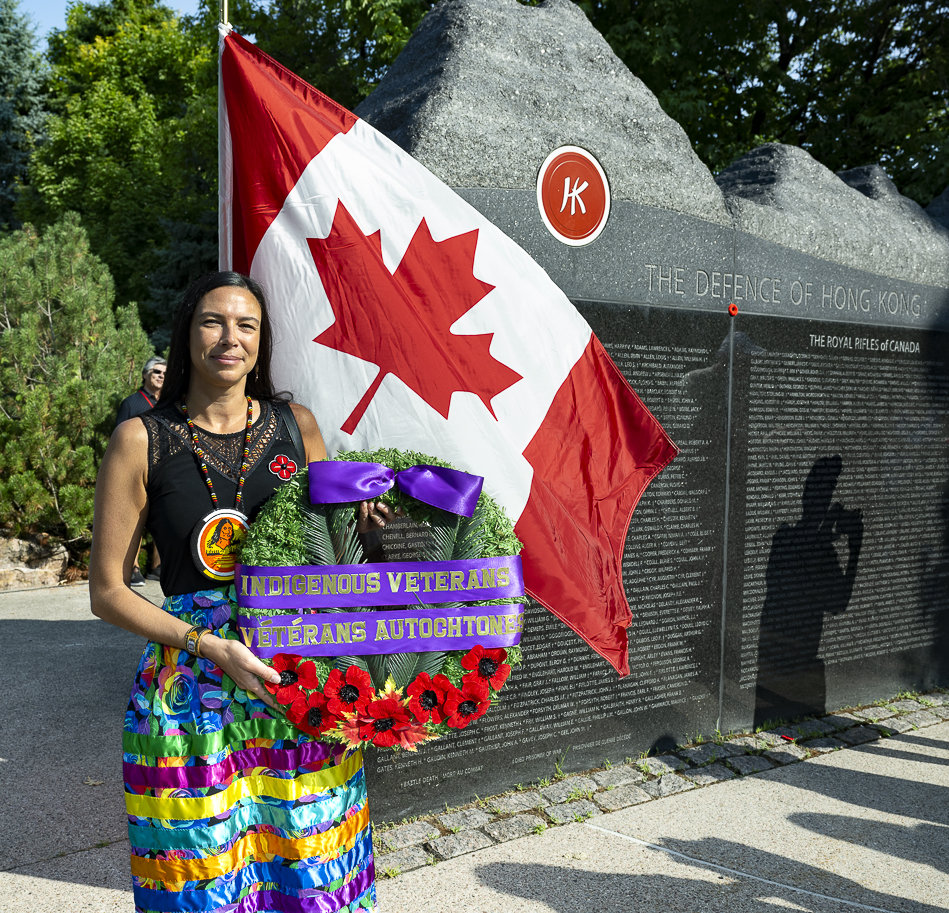Julie Carver,  great niece of Private Robert 
					Blanchard of the Winnipeg Grenadiers, at the Memorial Wall 
					(Richard Lawrence photo)