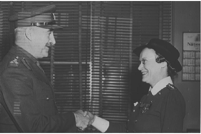 Halifax 1944, Lieut. Nursing Sister Anna May Waters received Royal Red Cross, second class, from Brigadier J.C. Stewart, CBE, DSO, district officer commanding MD